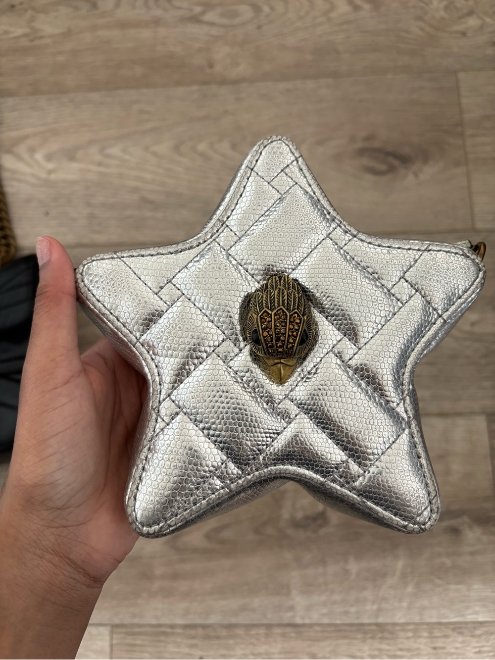 Kurt Geiger Metallic Silver Star Wristlet with Ornate Emblem